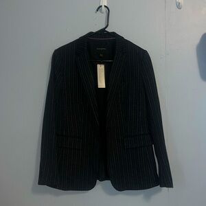 Brand: Banana Republic. Black blazer with light white stripes.